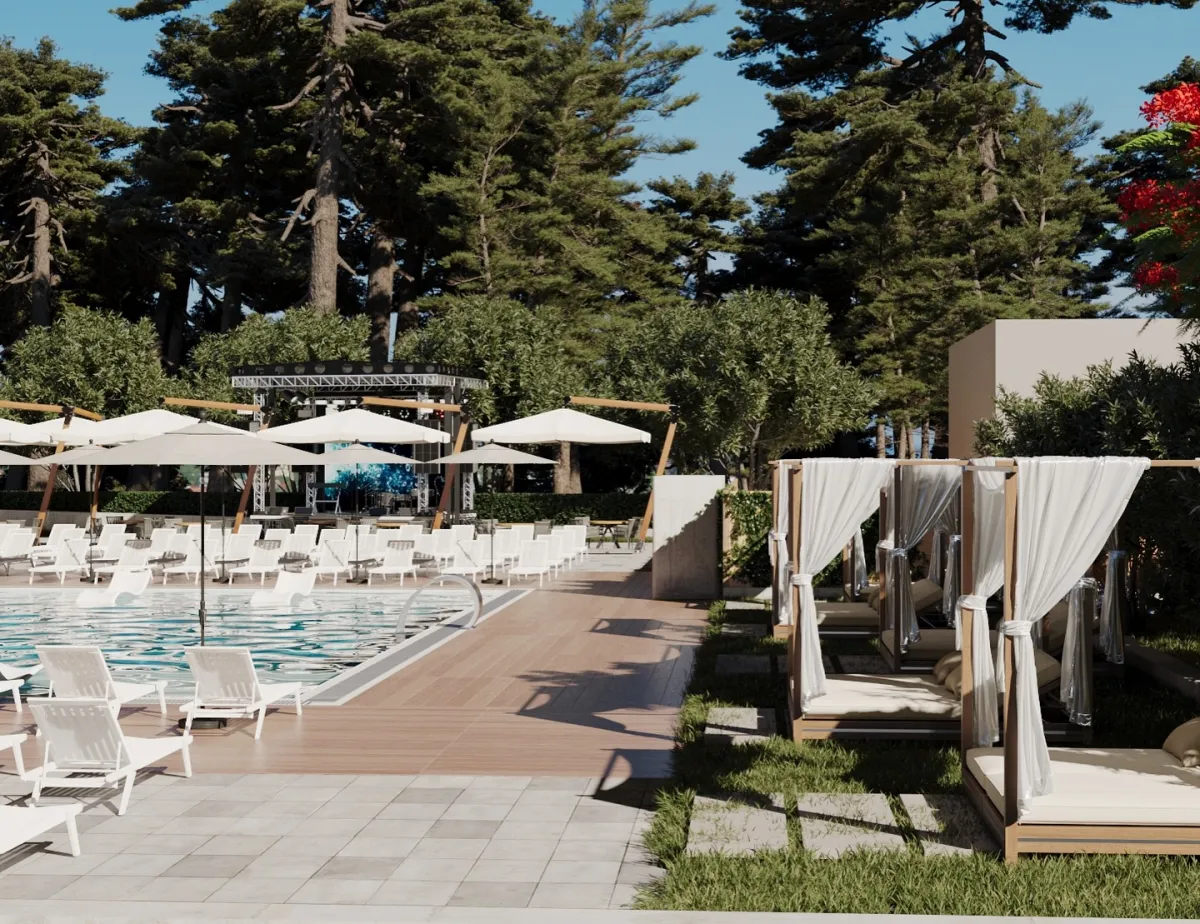 Басейни Riviera з м’якими шезлонгами, дитячою зоною та рестораном на фоні